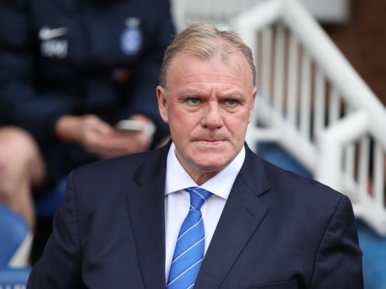 Steve Evans will keep his feet on the ground