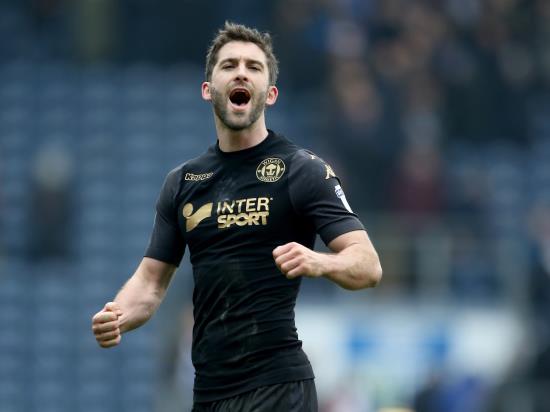 Will Grigg hat-trick guides Wigan to victory over MK Dons