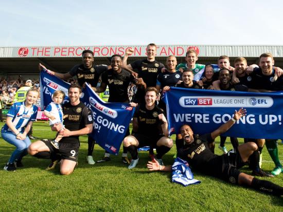 Wigan boss Paul Cook eyeing title after promotion to Championship