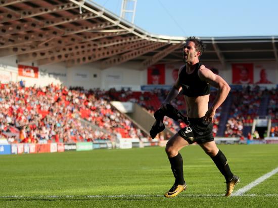 Will Grigg winner at Doncaster clinches title for Wigan