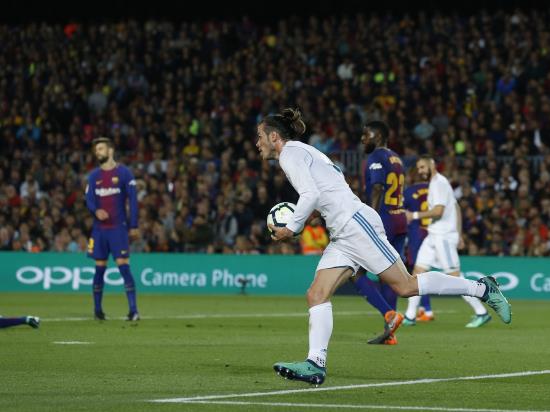 Barcelona 2 - 2 Real Madrid: 10-man Barca hold Real to move a step closer to unbeaten season