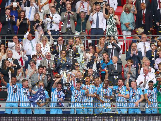 Mark Robins toasts historic promotion for Coventry