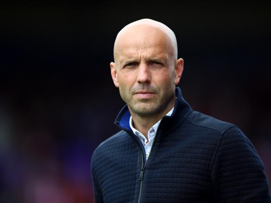 Paul Tisdale dejected after MK Dons drop late points at Swindon