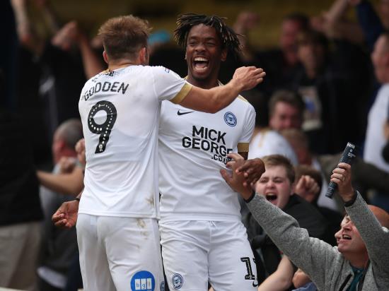 Peterborough back on top of League One after thrilling win at Gillingham