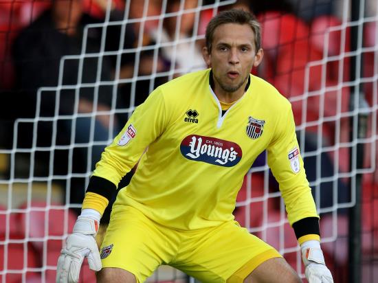 McKeown penalty save earns Grimsby draw with Exeter