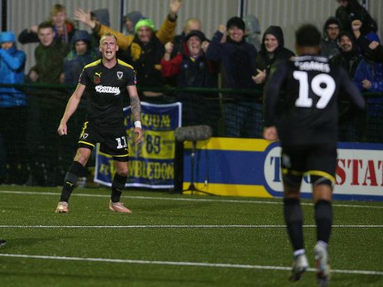 Pinnock lifts AFC Wimbledon from foot of League One table after Plymouth win