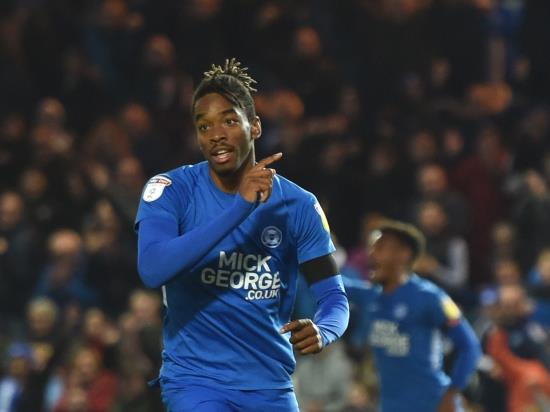 Butler and Toney fire Peterborough to victory over promotion rivals Portsmouth