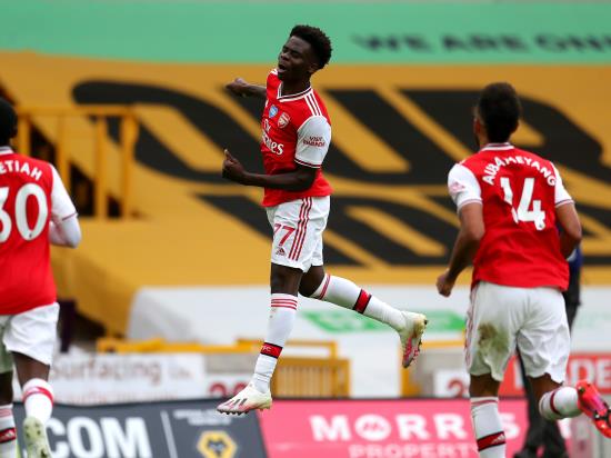 Bukayo Saka celebrates new deal with first league goal as Arsenal see off Wolves