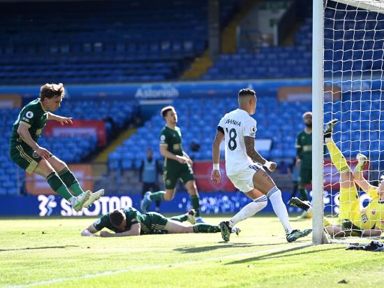 Phil Jagielka puts through his own goal as Leeds beat doomed Sheffield United