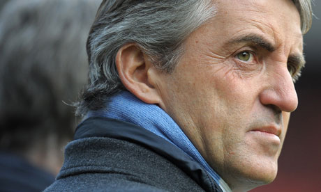 Roberto Mancini convinced Manchester City are closing gap on United