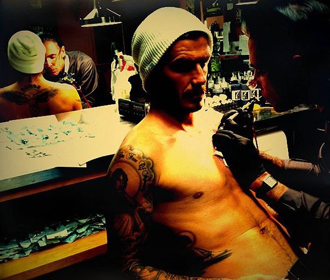 Beckham posts new tattoo on Facebook
