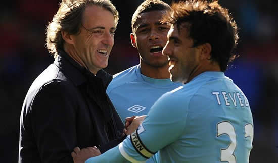 Carlos Tevez: I'm back in love with my Manchester City boss Roberto Mancini!