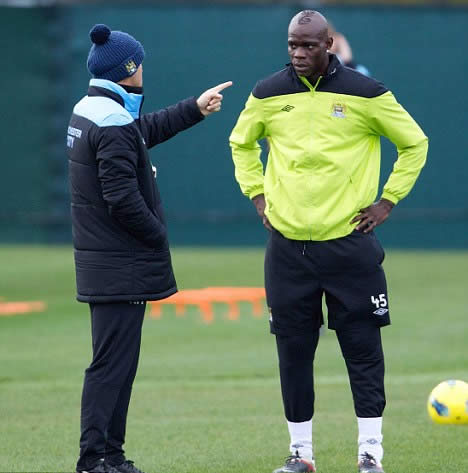 Hair we go! Balotelli's barnet goes down a storm as Man City striker unveils mohican