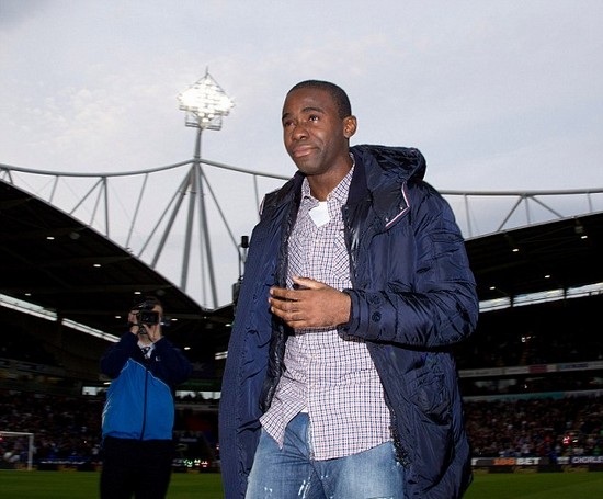 Muamba weeps during emotional return at the Reebok to thank Bolton and Spurs fans for support following his cardiac arrest