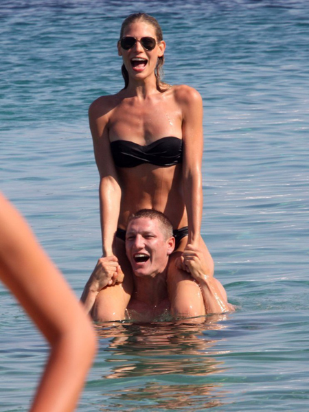 Bastian Schweinsteiger went on a summer beach vacation with his girlfriend