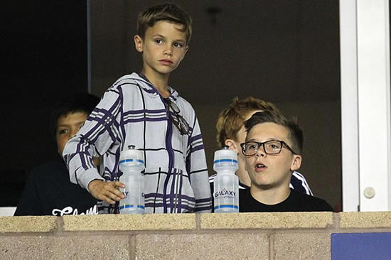 Brooklyn Beckham looks good in specs from mum's collection