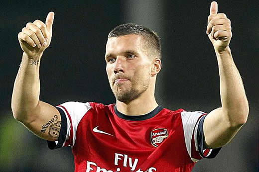 Lukas Podolski is considering having an Arsenal tattoo