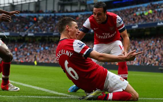 Manchester City 1-1 Arsenal: Koscielny saves point for Gunners after Lescott opener