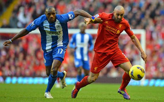 Liverpool 3-0 Wigan: Sensational Suarez seals comfortable Reds win