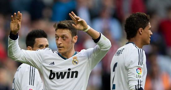 Ozil brace boost Madrid