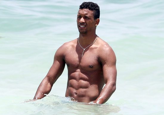 Relaxing with a six-pack on holiday: This time it's Nani putting summer slobs to shame
