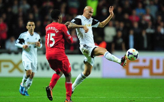 Swansea 2 - 2 Liverpool: Shelvey hero and villain in topsy-turvy match