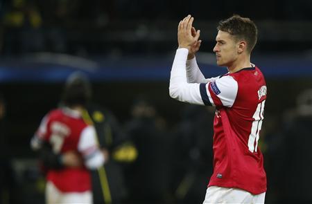 Patient Arsenal beat Dortmund to take group lead