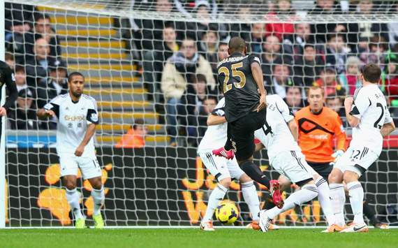 Swansea City 2-3 Manchester City: Kolarov seals seventh straight win for Pellegrini's pacesetters