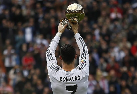 Take a Berna-bow! Ronaldo parades his Ballon d'Or award as fans turn stadium into a golden shrine to CR7