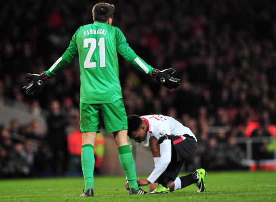 Daniel Sturridge ties Arsenal goalkeeper’s shoe near the end of Liverpool’s FA Cup loss