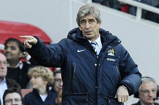 You're title contenders! Man City boss Manuel Pellegrini says Chelsea CAN win the league