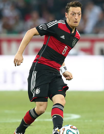 Former Germany captain Michael Ballack fears Arsenal have ruined Mesut Ozil