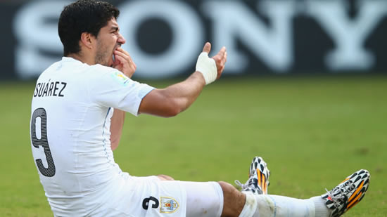 Luis Suarez banned from all football for four months and for Uruguay for nine matches