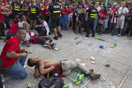 Costa Rica fans left lying in pools of blood at fan park