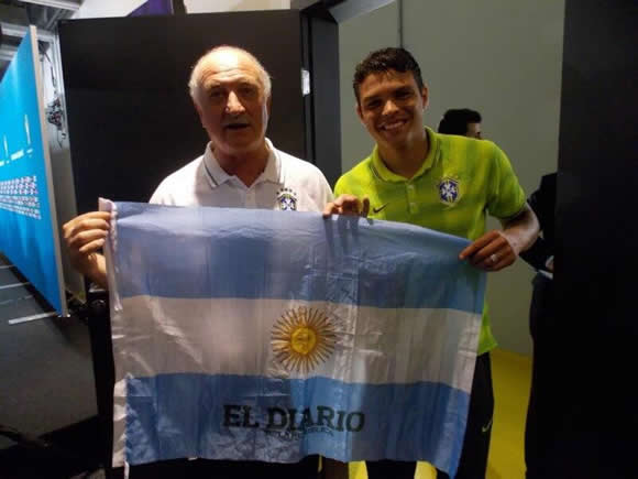 Brazil manager and captain pose with 'lucky' Argentina flag