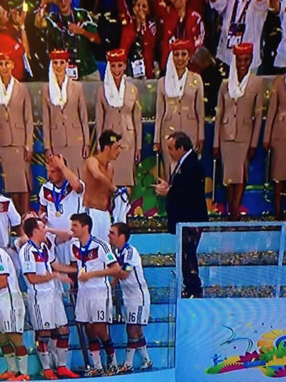 Michel Platini asked Mesut Ozil for his shirt during Germany’s World Cup celebrations