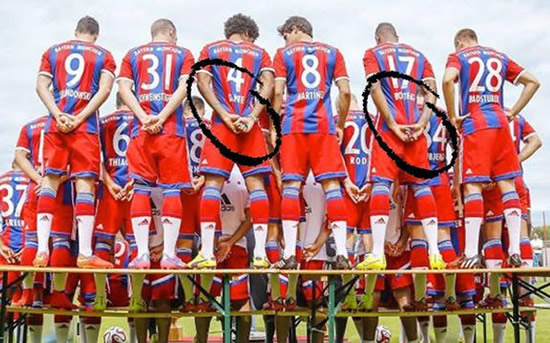 Jerome Boateng & Dante caught pulling shirts to make themselves look buff in Bayern team photo