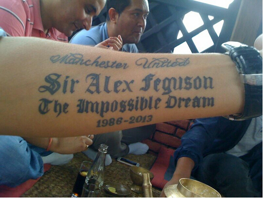 Man United fan gets a massive Sir Alex Ferguson tattoo on his arm, bad spelling error