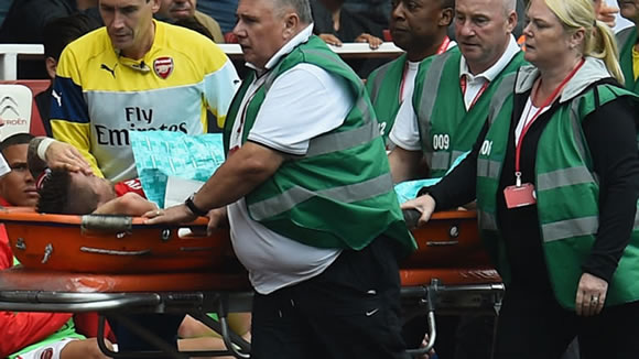 Arsenal's Debuchy out for three months after ankle surgery