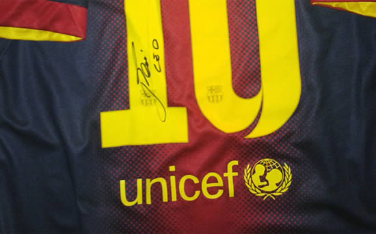 Lukas Podolski puts Leo Messi's signed Barca up for charity auction