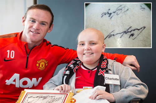 Man United players sign the head of a brave girl suffering from leukaemia after she lost her hair
