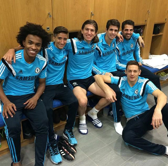 Fulham's Jose Mourinho Jr gets a picture with Chelsea's Willian, Filipe Luis, Oscar, Fabregas & Matic