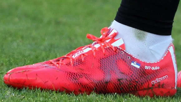 Bayern’s Bastian Schweinsteiger uses his boots to big up his relationship with Ana Ivanovic