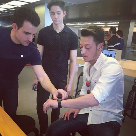 Arsenal’s Mesut Ozil shows off new Apple Watch