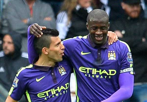 Swansea City 2-4 Manchester City: Hart saves visitors after Toure double