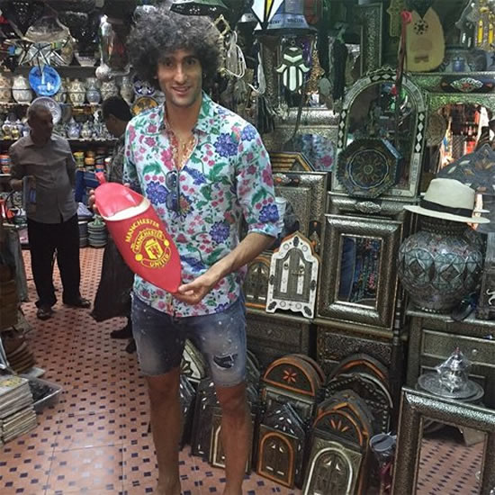 Photo: Marouane Fellaini finds Man Utd reminder in Morocco