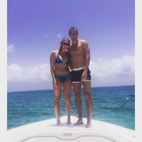 Tottenham star enjoys boat trip with his girlfriend