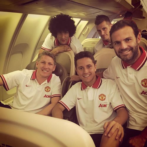Juan Mata all smiles with new Man Utd signings on plane