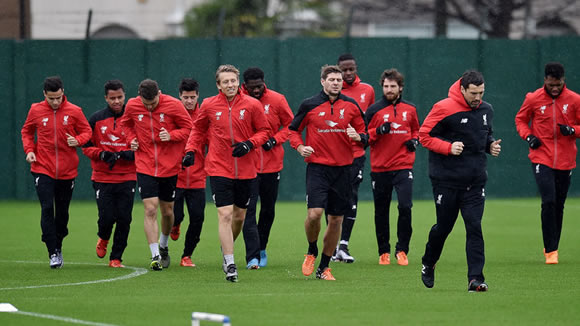 Steven Gerrard trains with Liverpool squad