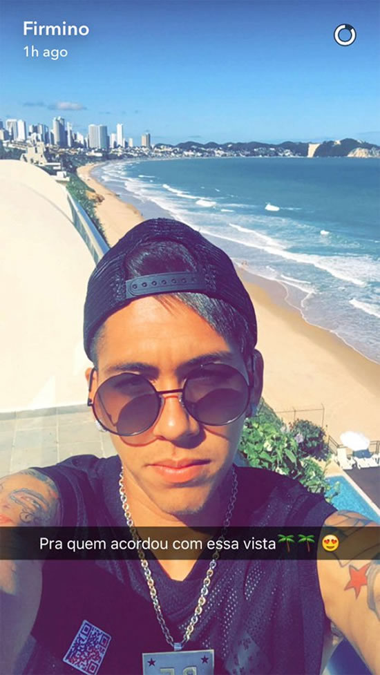 Liverpool’s Roberto Firmino soaks up the rays on holiday